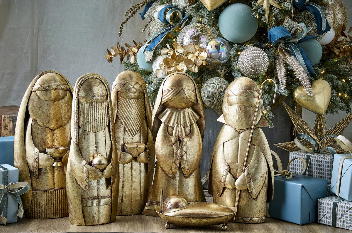 Sapphire Sanctuary gold nativity figures and blue wrapped gifts